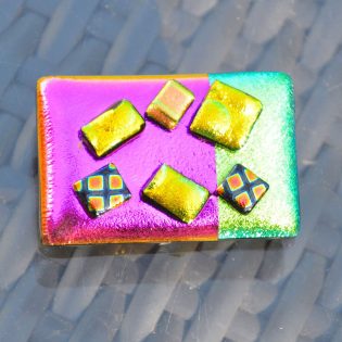Large Dichroic Glass Brooch with a Sterling Silver Fitting Bright Metallic Colours