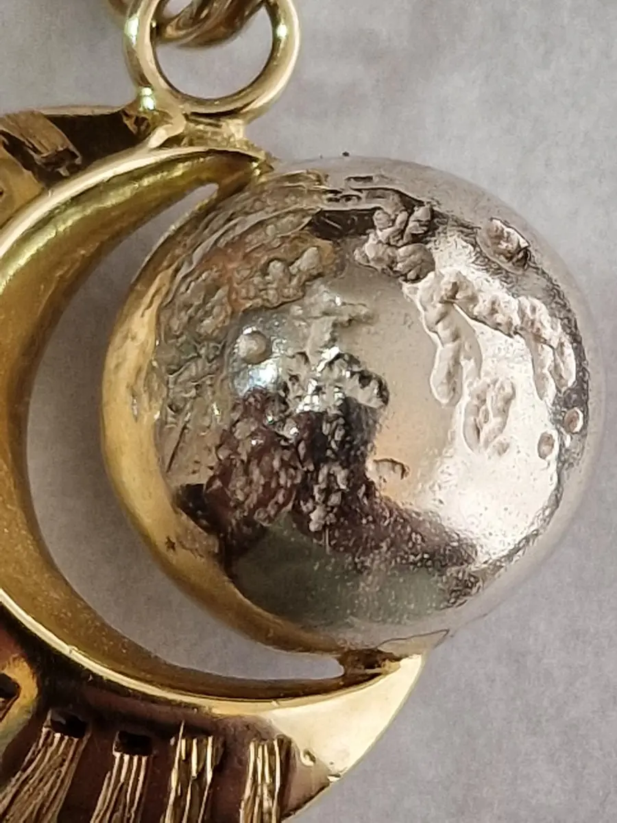 Close up of Silver Moon on Pendant